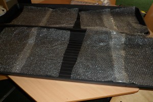 Base layer of bubble wrap in tray